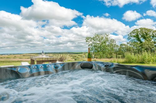 A hot tub with views over the countryside